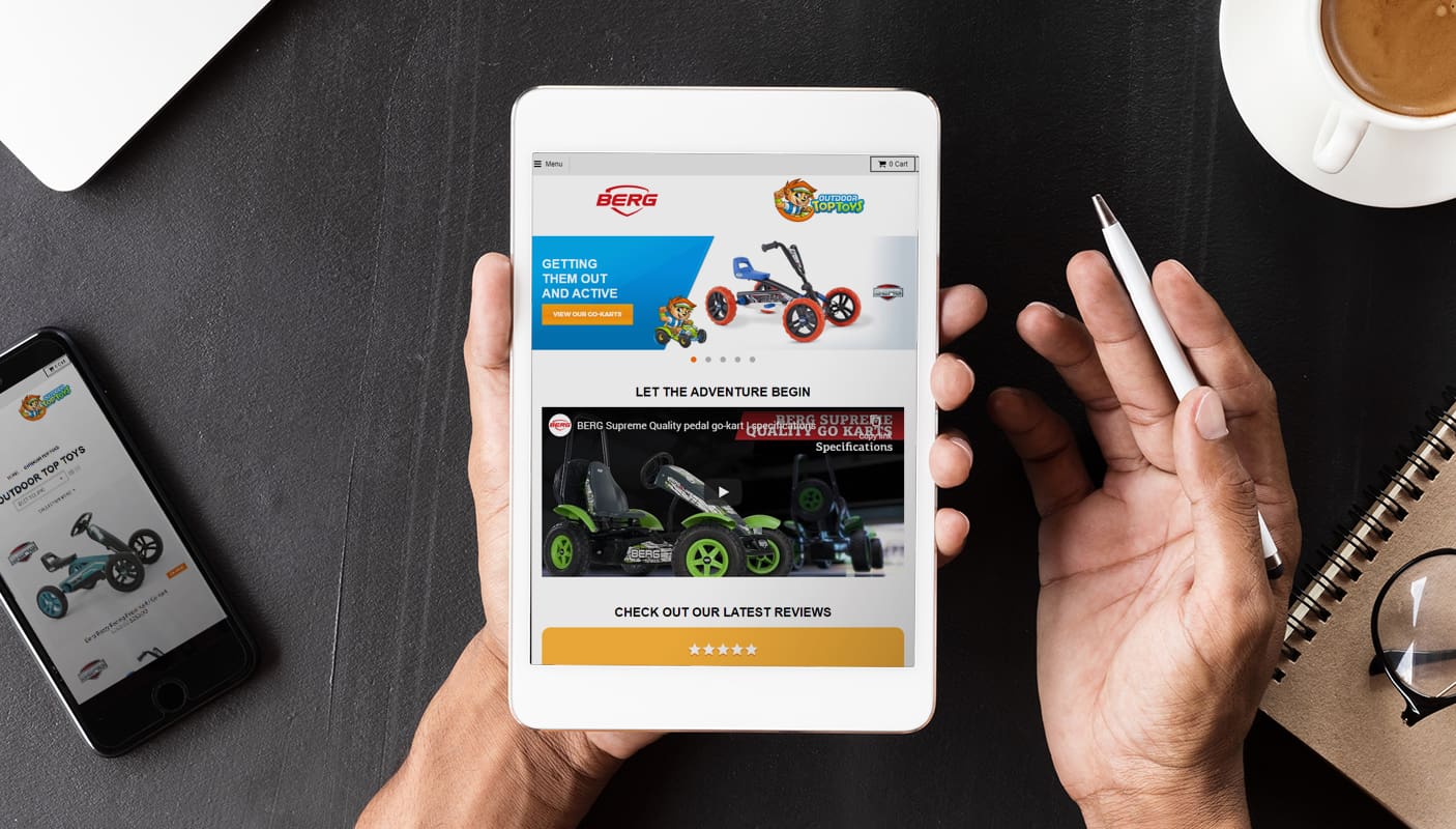 Ecommerce website design for a toy store displayed on a tablet and phone